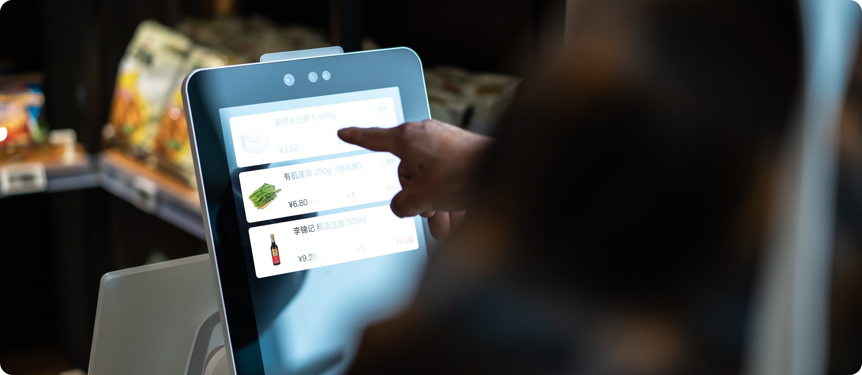 Customer tapping items on the Sunmi K2 Mini vertical self-ordering touchscreen