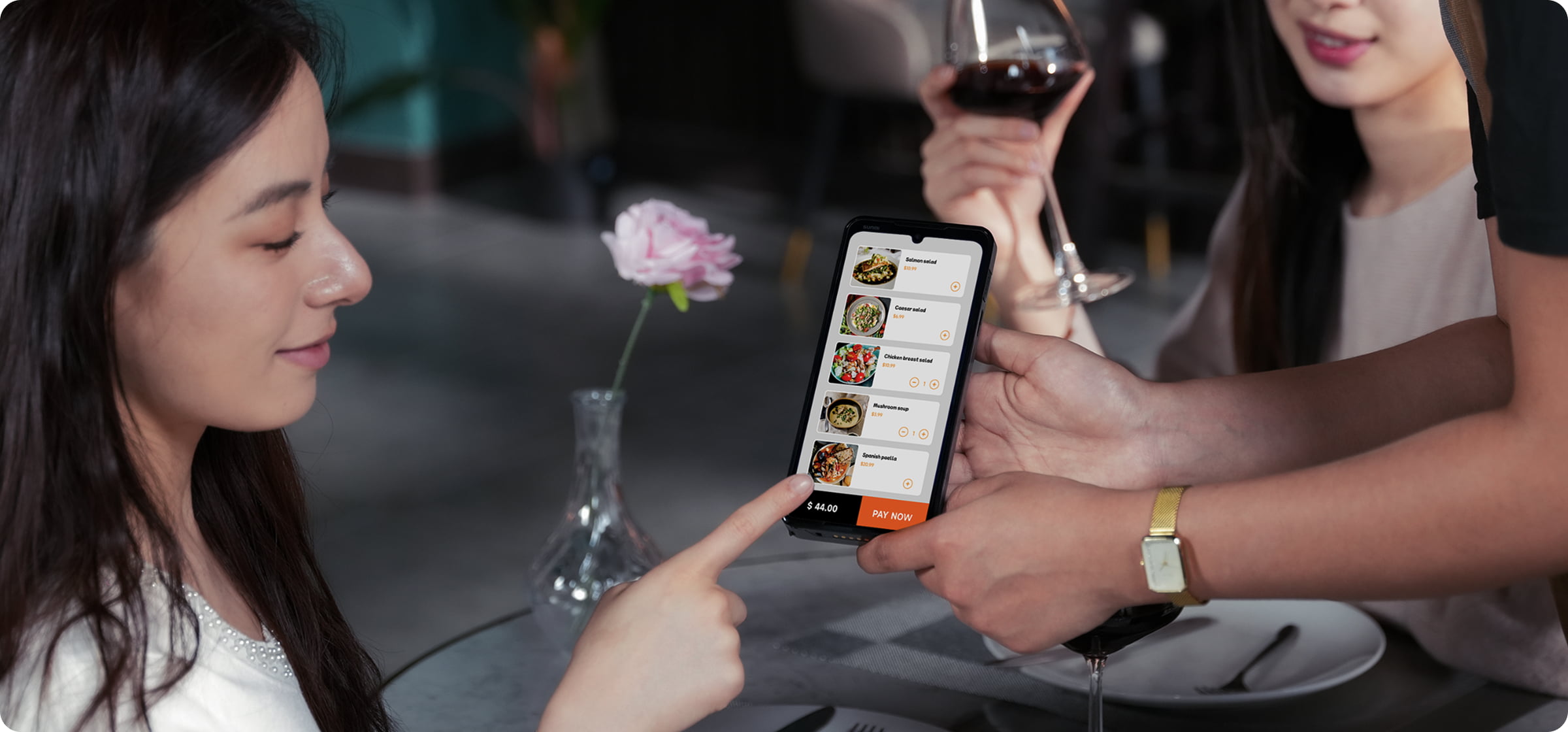 Sunmi M3 used for tableside ordering in a restaurant
